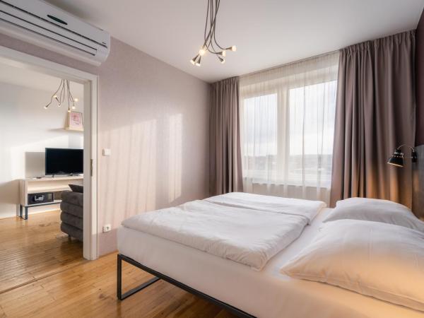 EA ApartHotel Melantrich : photo 5 de la chambre appartement supérieur avec terrasse - 4 personnes