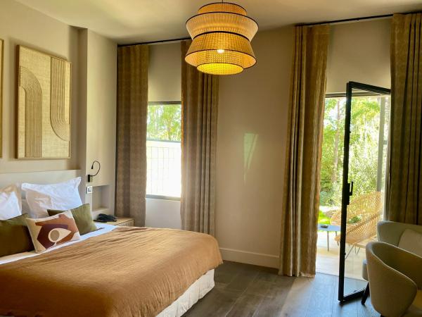 Les Lodges Sainte-Victoire Hotel & Spa : photo 4 de la chambre chambre triple deluxe avec accès gratuit au spa