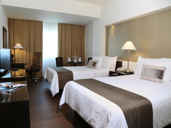 Mesón Ejecutivo Guadalajara Minerva - Av México : photo 4 de la chambre chambre supérieure avec 2 lits doubles
