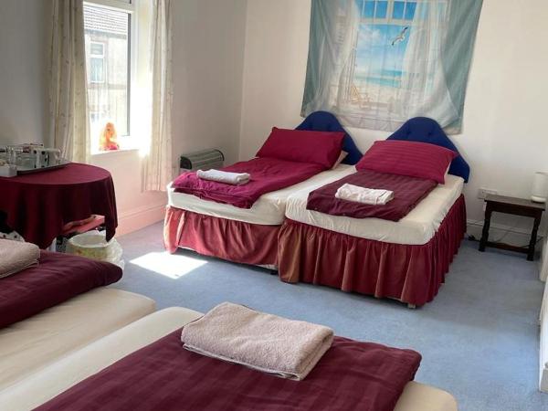 The Blue Moon : photo 2 de la chambre chambre quadruple avec douche