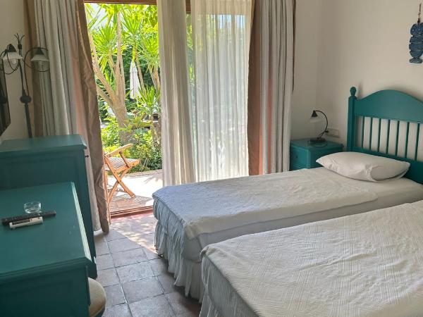 Munahan : photo 4 de la chambre chambre lits jumeaux