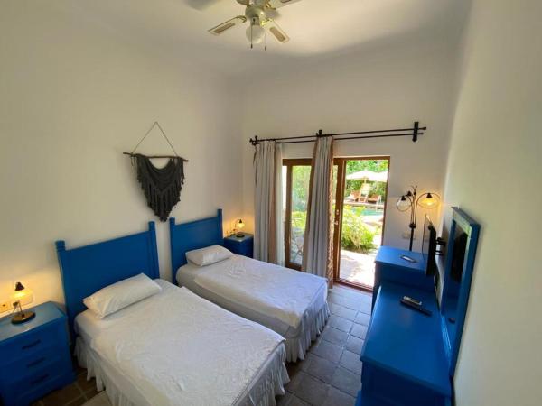 Munahan : photo 8 de la chambre chambre lits jumeaux