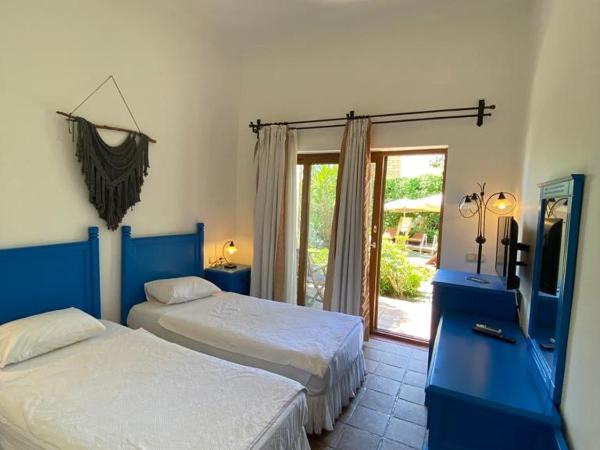 Munahan : photo 7 de la chambre chambre lits jumeaux