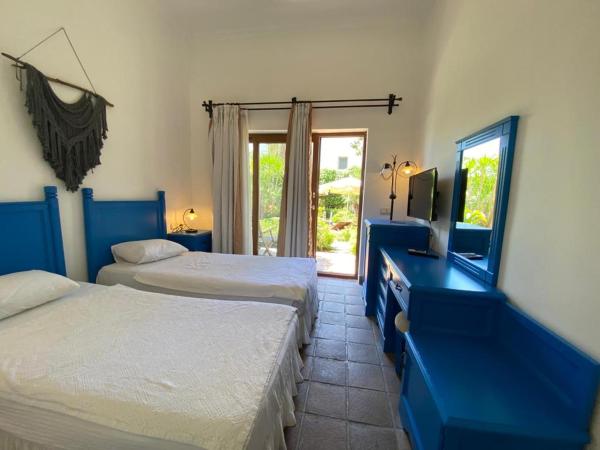 Munahan : photo 5 de la chambre chambre lits jumeaux