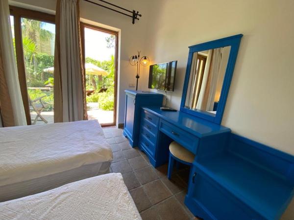 Munahan : photo 9 de la chambre chambre lits jumeaux