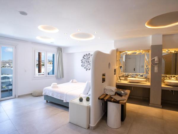 Ibiscus Boutique : photo 10 de la chambre suite avec jacuzzi extérieur