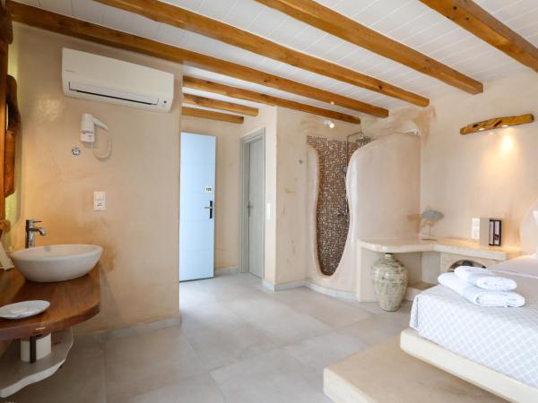 Ibiscus Boutique : photo 9 de la chambre suite junior avec bain à remous extérieur