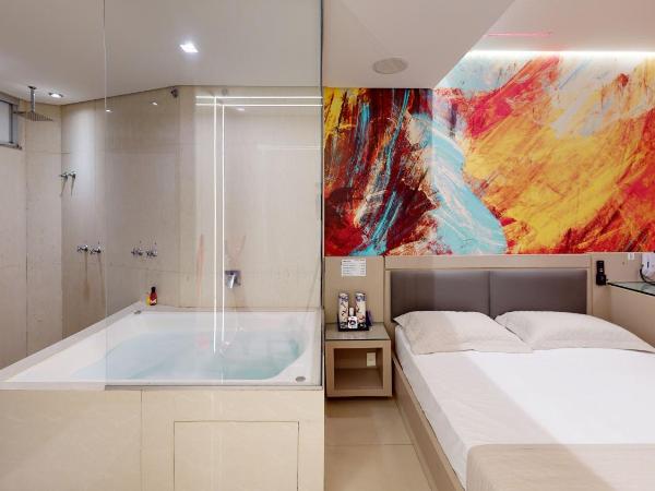 Motel DUBAI BH : photo 2 de la chambre suite deluxe avec baignoire spa