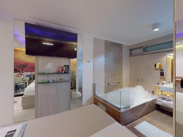 Motel DUBAI BH : photo 3 de la chambre suite avec baignoire spa