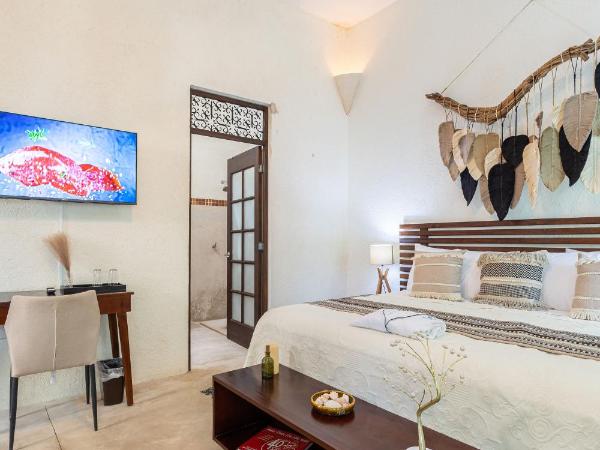 Casa Dos Lirios Hotel Boutique : photo 8 de la chambre chambre lit king-size - vue sur piscine 