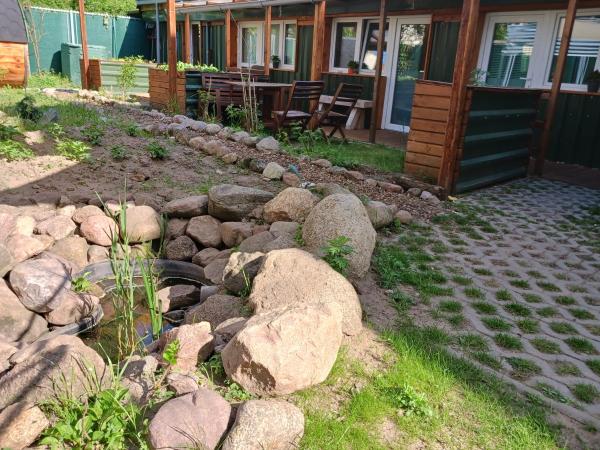 Squat Deluxe Berlin, the hostel : photo 8 de la chambre chambre quadruple - vue sur jardin