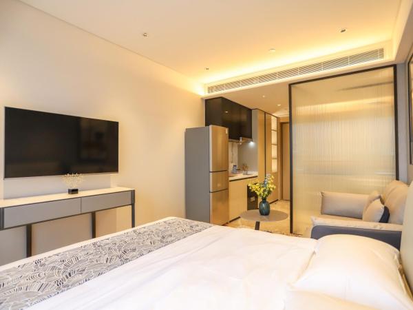 Canopy Executive Apartments - Shenzhen Futian Center : photo 7 de la chambre appartement avec balcon
