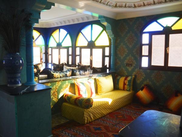 The Sunrise Villa : photo 4 de la chambre chambre familiale - vue sur jardin