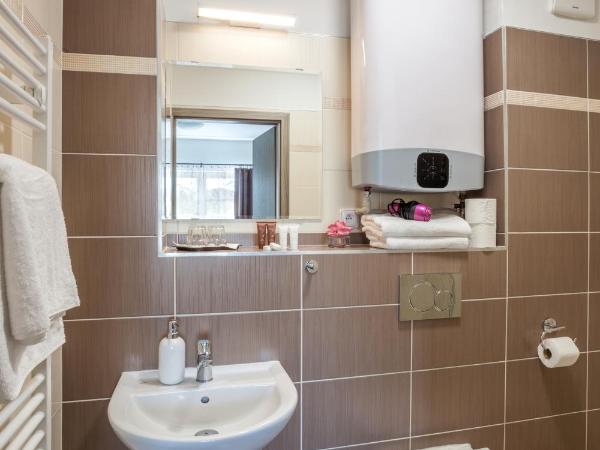 Elendris - Ubytování u kostela : photo 4 de la chambre chambre deluxe double ou lits jumeaux
