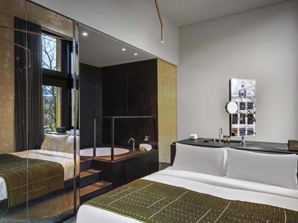 W Amsterdam : photo 1 de la chambre grande chambre sublime bank lit king-size avec baignoire