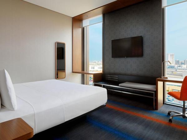 Aloft Me'aisam, Dubai : photo 1 de la chambre chambre aloft - lit king-size (navette gratuite vers la station de métro sobha realty, la plage jbr beach et le centre commercial mall of the emirates)