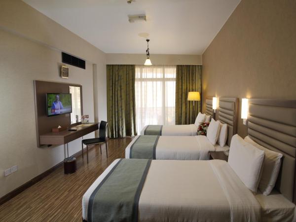 Wave International Hotel : photo 3 de la chambre chambre triple standard