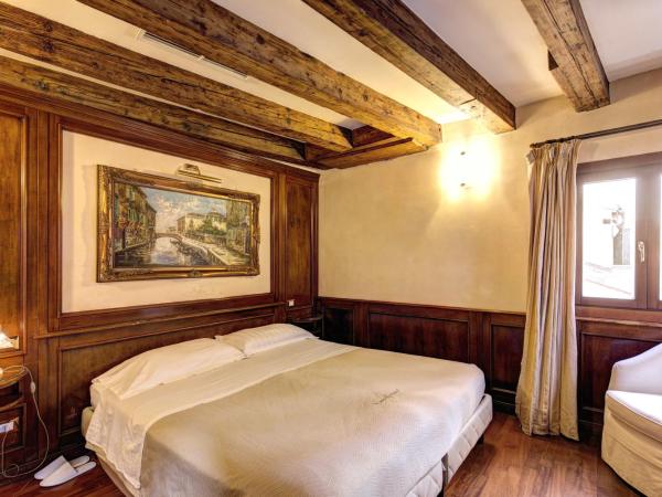 Palazzo La Scala : photo 6 de la chambre chambre double ou lits jumeaux