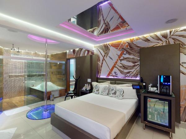 Motel DUBAI BH : photo 10 de la chambre suite lit king-size avec baignoire spa