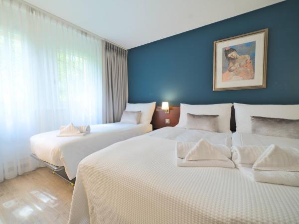 Tulip Inn Beaulieu Lausanne : photo 7 de la chambre chambre supérieure avec lit king-size