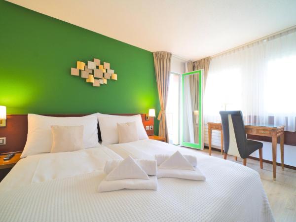 Tulip Inn Beaulieu Lausanne : photo 4 de la chambre chambre lit king-size standard