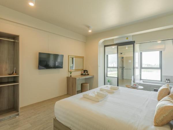 Ang Pao Hotel - SHA Extra Plus : photo 4 de la chambre chambre lit king-size avec vue