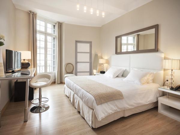 Hôtel de France : photo 2 de la chambre chambre double ou lits jumeaux prestige