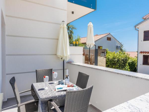 Villa Palma Krk : photo 5 de la chambre appartement avec terrasse