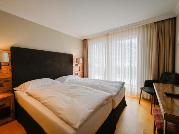 Romantik Hotel Schweizerhof : photo 3 de la chambre suite 3 chambres supérieure - vue sur l'eiger