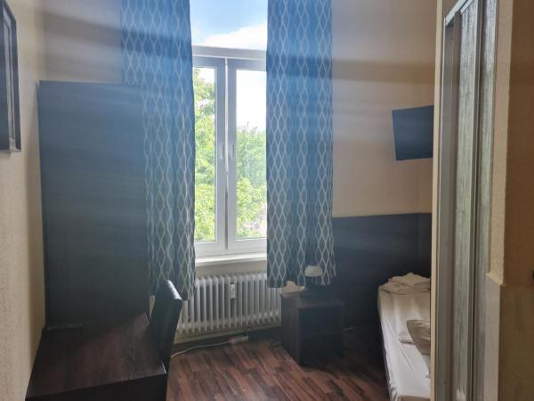 Hotel Am Stuttgarter Eck : photo 3 de la chambre chambre simple avec douche et toilettes communes