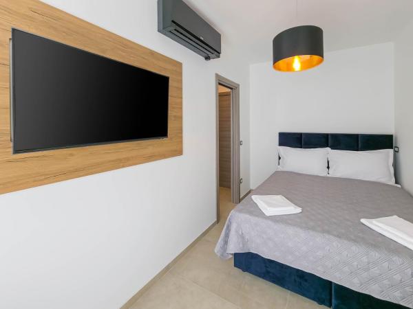 Maresole Beachfront Residence : photo 7 de la chambre chambre quadruple