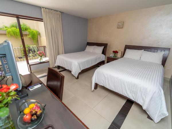 Casa de las Flores Hotel : photo 1 de la chambre chambre double avec 2 lits doubles