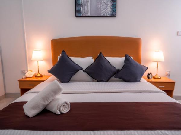 العاصمة للشقق الفندقية - Capital Hotel Apartments : photo 1 de la chambre chambre lit king-size deluxe