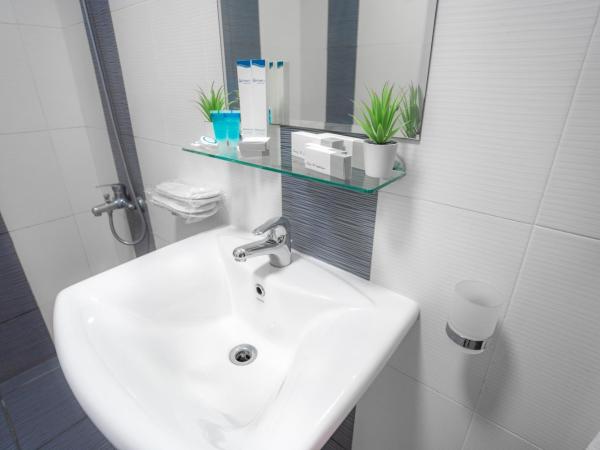 العاصمة للشقق الفندقية - Capital Hotel Apartments : photo 10 de la chambre chambre lit king-size deluxe