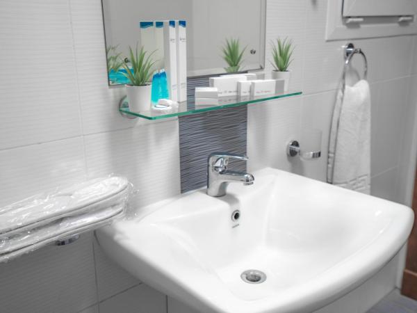 العاصمة للشقق الفندقية - Capital Hotel Apartments : photo 10 de la chambre chambre triple