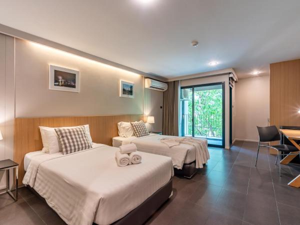 Naga Residence : photo 2 de la chambre deluxe twin room with balcony