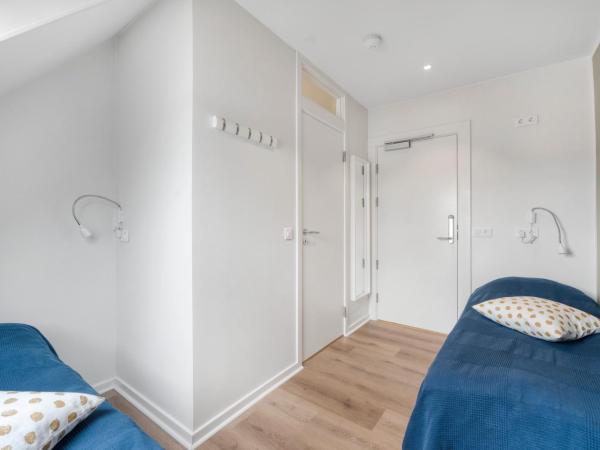 Kragsbjerggaard Vandrerhjem : photo 1 de la chambre chambre lits jumeaux avec salle de bains privative