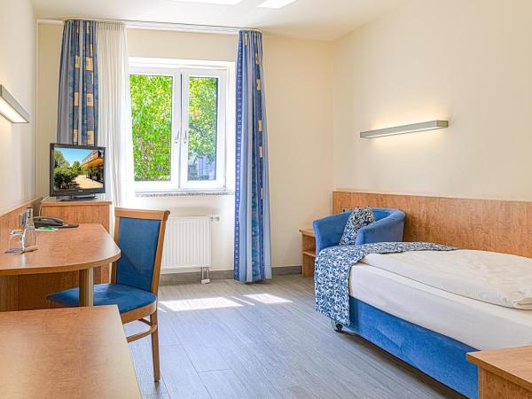 Hotel Am Moosfeld : photo 1 de la chambre chambre simple confort