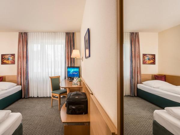 Hotel Am Moosfeld : photo 1 de la chambre chambre lits jumeaux classique
