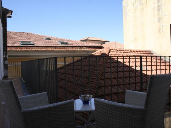 La Casa dell'Orologio - MAIN SQUARE : photo 6 de la chambre chambre double ou lits jumeaux avec balcon