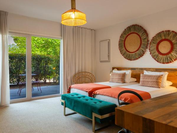 Le Balamina : photo 1 de la chambre chambre lits jumeaux avec terrasse