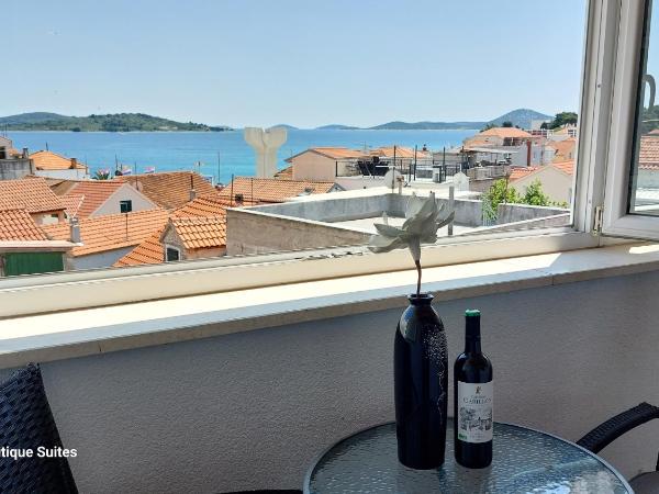 Refresh Boutique Suites - Central Point : photo 3 de la chambre suite lit king-size - vue sur mer