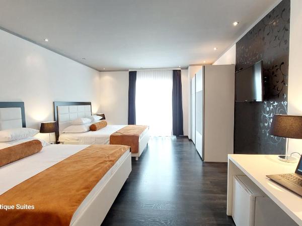 Refresh Boutique Suites - Central Point : photo 1 de la chambre suite supérieure lit king-size
