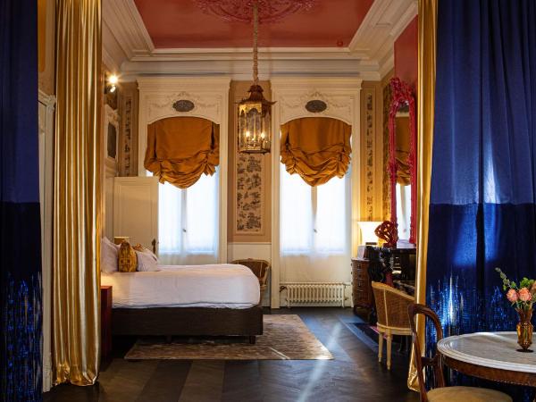Cabosse, Suites & Spa : photo 1 de la chambre suite lit king-size avec balcon