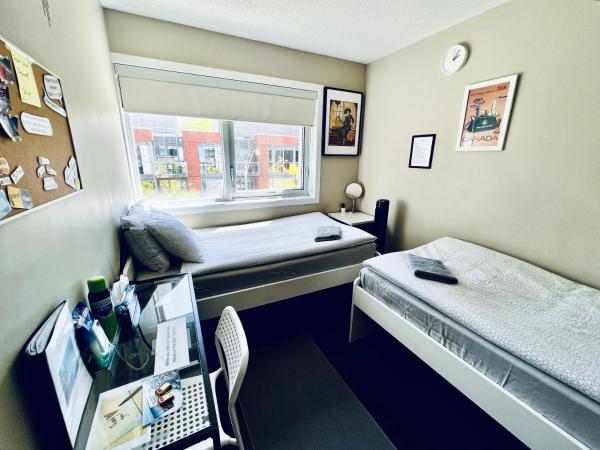 Home in Downtown : photo 1 de la chambre chambre lits jumeaux