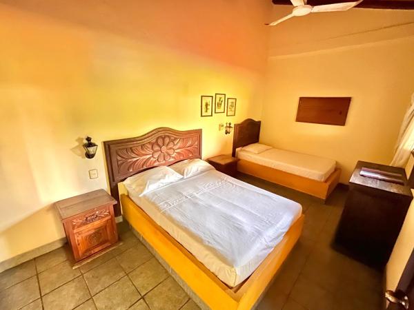 Hotel Rancho Escondito : photo 4 de la chambre chambre triple avec terrasse