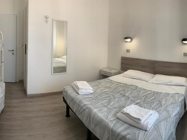 Hotel Laika : photo 9 de la chambre chambre quadruple