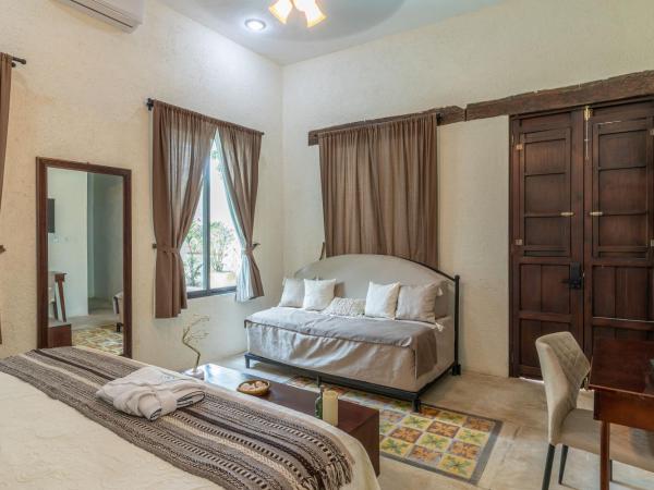 Casa Dos Lirios Hotel Boutique : photo 2 de la chambre chambre lit king-size - vue sur piscine 
