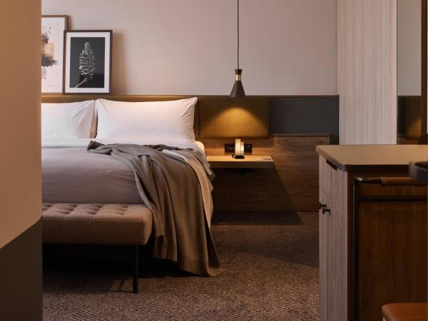 Rydges Melbourne : photo 2 de la chambre hébergement d'angle avec lit king-size