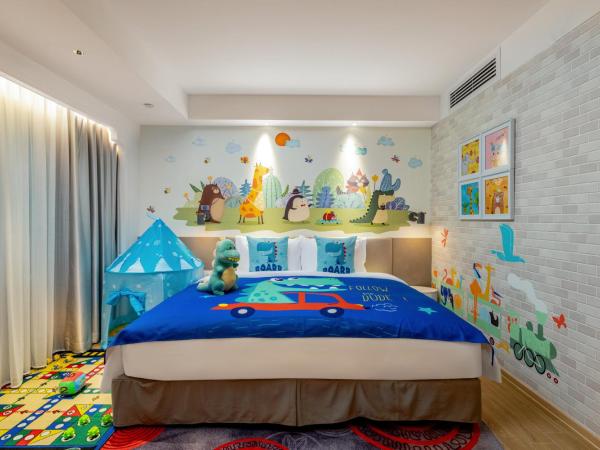 voco Guangzhou Shifu, an IHG Hotel : photo 4 de la chambre 2 king 2 bedroom suite living area kids theme